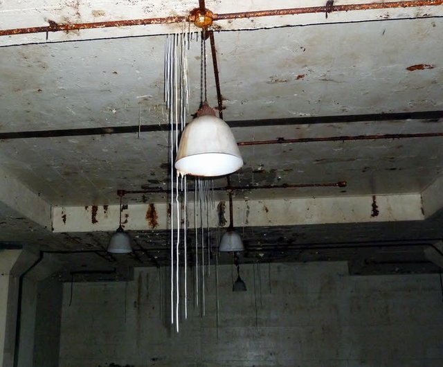 Picture of fragile stalactites hanging in the bunker's ceiling.